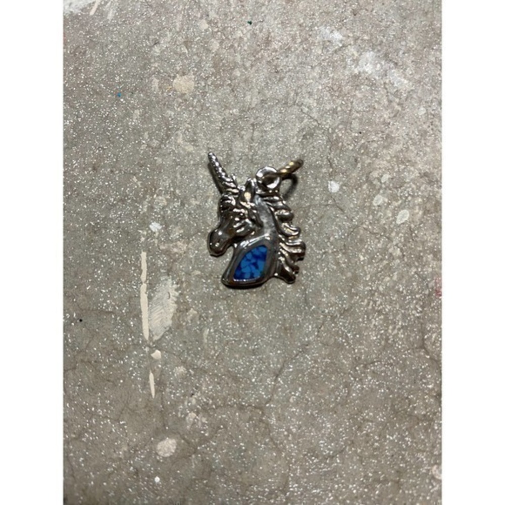 Vintage unicorn pendant with mosaic turquoise.